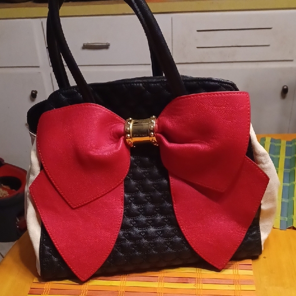 Betsey Johnson Handbags - Betsey Johnson Black Satchel with Red Bow and Gold Accent